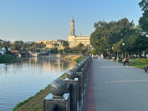 Lopan River embankment with Dormition Cathedral bell tower in Kharkiv, Ukraine