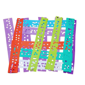 Colorful paper strips with punched holes interwoven isolated on a transparent background