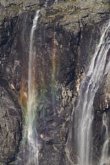 Tall waterfalls cascading down a cliff © Maryna