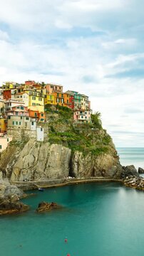 Vertical Time Lapse of the beautiful and scenic seaside village of Manarola in Italy. One of the small towns that makes up Cinque Terre.