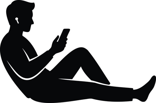Black silhouette of a man sitting on the floor while using a smartphone and wearing wireless earbuds isolated on a white background