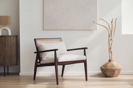 Modern scandinavian style interior with chair and trendy vase, Home staging and minimalism concept, Soft natural light, calm cozy atmosphere.