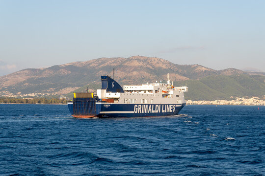Corfu, Greek - september 13 2026: Large Grimaldi Lines ferry boat traveling across the sea, transporting vehicles and passengers