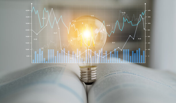 A light bulb sits atop an open book, symbolizing innovative ideas. Financial graphs overlay the scene, representing growth and knowledge in a business context. Scalp