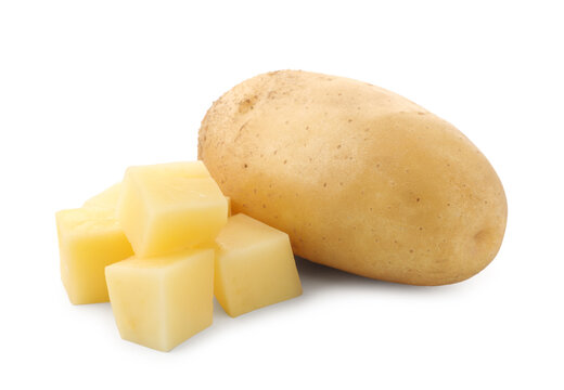 Whole and cut young potatoes isolated on white