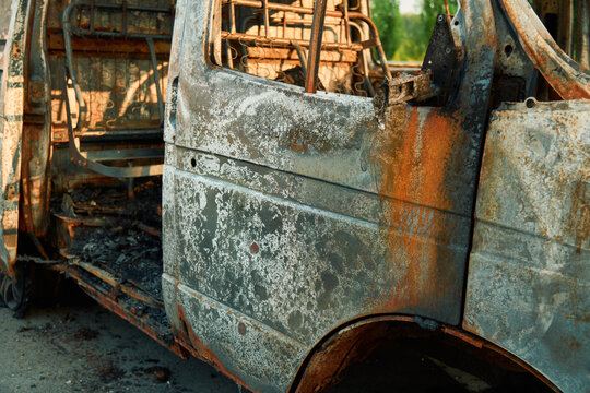 Charred Car Interior Inside Burned Delivery Van with Metal Seat Frames