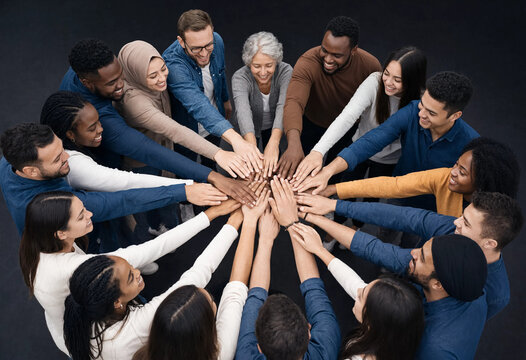Diverse Group Of People Celebrating Unity Through Collaboration