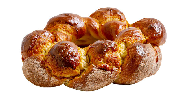 Isolated glossy golden braided challah bread loaf, traditional holiday baked good