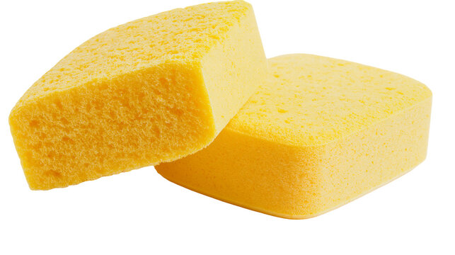 Isolated Yellow rectangular sponges used for household cleaning and personal care products.