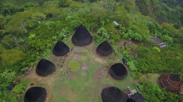 Aerial view of iconic Mbaru Niang traditional cone houses in Wae Rebo village Flores