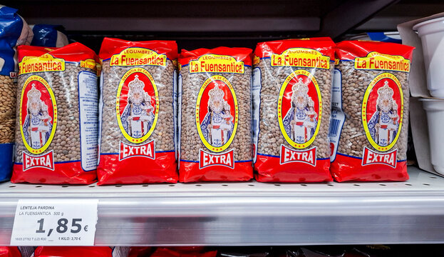 Denia, Spain - May 20, 2026.Red packages of La Fuensantica Lenteja Pardina on a grocery shelf in a Spanish supermarket