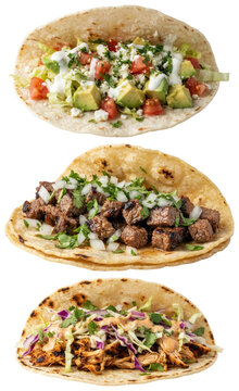 A collection of three soft shell tacos filled with steak, avocado, and chipotle chicken, each topped with fresh garnishes.