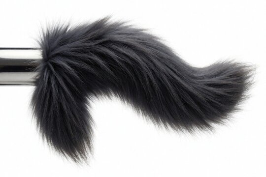 Metal anal plug with soft grey fox tail. Stainless steel sex toy features fluffy faux fur for kinky roleplay cosplay. Adult pleasure accessory designed for erotic fun, fantasy games, sexual