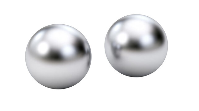 Isolated shot of two highly polished metallic spheres reflecting light, symbolizing precision and innovation.