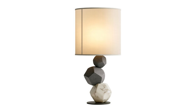Isolated modern table lamp with stacked faceted concrete and marble base, elegant lighting.