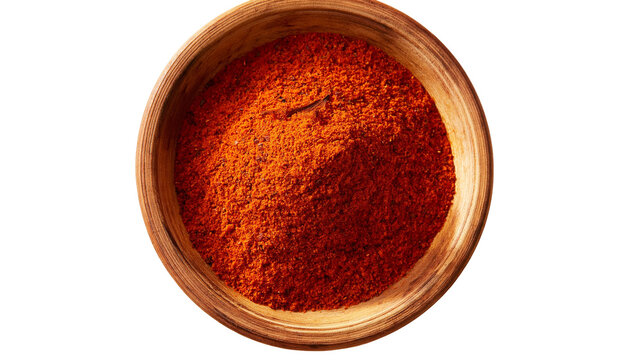 Isolated wooden bowl filled with vibrant red paprika spice, top view, aromatic culinary ingredient