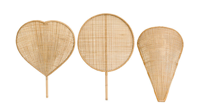 Isolated group of three natural woven bamboo fans with heart, round and cone shapes