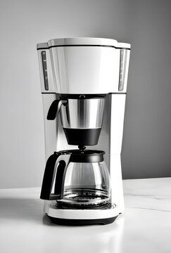 Morning routine and breakfast lifestyle, modern white coffee maker with glass carafe on kitchen counter for home brewing and caffeine energy boost