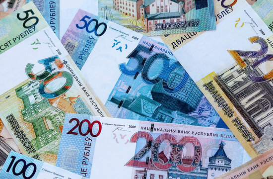 Belarusian ruble money banknotes pile on table. Belarus bills of BYN currency close up