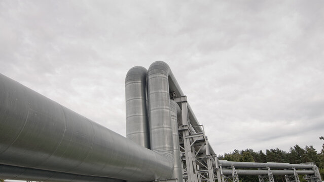 close-up of a pipeline against a gray sky