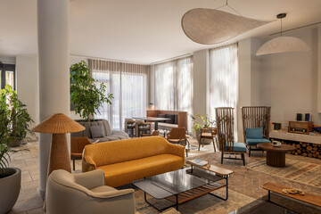 Obraz premium Luxury hotel lobby lounge area with stylish leather sofa and modern interior design
