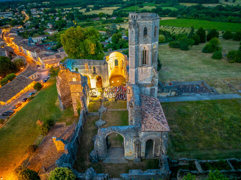 FRANCE. GIRONDE 33 ENTRE-DEUX-MERS, AERIAL VIEW OF THE ABBEY OF LA SAUVE-MAJEUR UNESCO WORLD HERITAGE SITE. SILVA MAJOR FESTIVAL