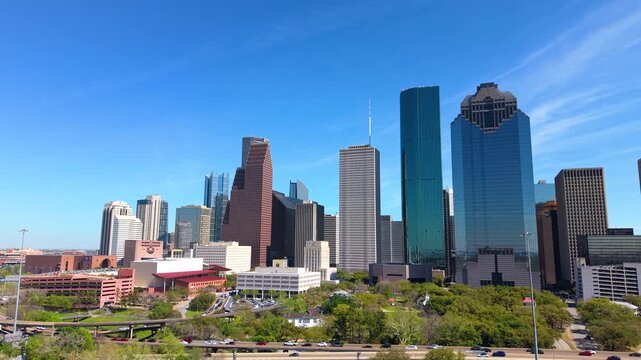 Aerial view of Houston, Texas with dense commercial district and busy roadways. Modern buildings in city impressive skyline.