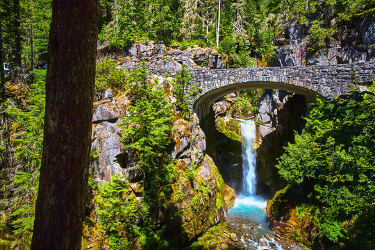 Christine Falls Waterfall and Stone Bridge in Lush Forest Mount Rainier National Park