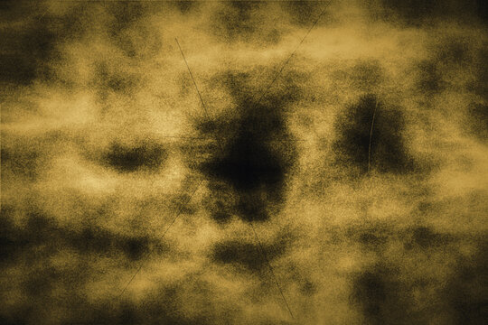 Vintage gold and black abstract textured background featuring heavy grain and intersecting scratch lines perfect for moody and antique design concepts.