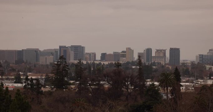 A winter storm passes over the downtown skyline of San Jose, California, USA.