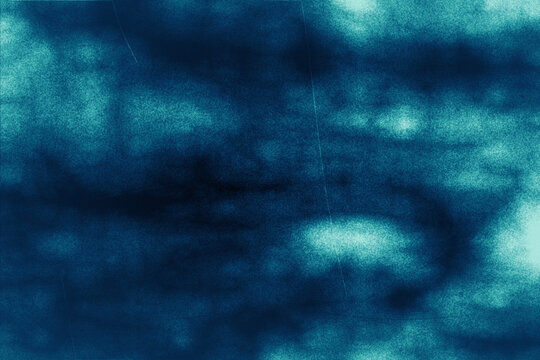 Abstract deep teal and dark blue textured background with subtle grain, suitable for moody overlays, ocean themes, or calming web graphics.