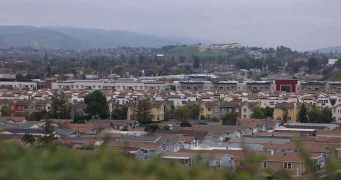 Aerial view of dense housing of the Communications Hill neighborhood of South San Jose, California, USA.