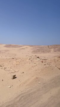 Expansive desert landscape under clear blue sky Egypt. Hurghada