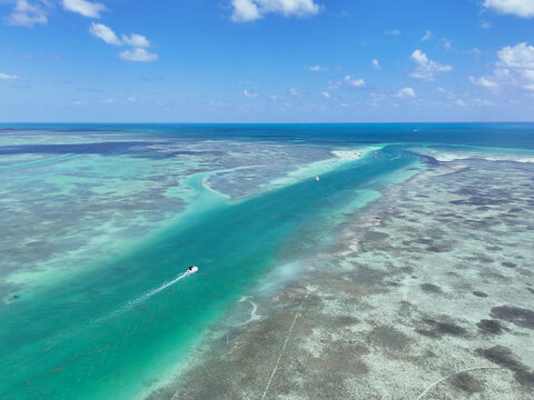 Boat heading to the Islamorada Sandbar through the Whale Harbor Channel at Islamorada in the Florida Keys.	