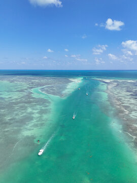Boats returning back from the ocean through Whale Harbor Channel at Islamorada in the Florida Keys.