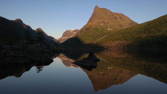Sunset, drone video, Lake Litlvatnet in Innerdalen high valley, Innerdalst&aring;rnet mountain area, Sunndal, M&oslash;re og Romsdal, Vestlandet, Norway