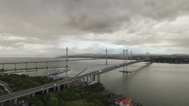 Forth Road Bridge and The Queensferry Crossing from a drone, Queensferry Crossing, Forth Estuary, Scotland, United Kingdom