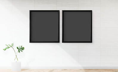 Minimalist blank frames on modern wall, suitable as mockup © Rawpixel.com