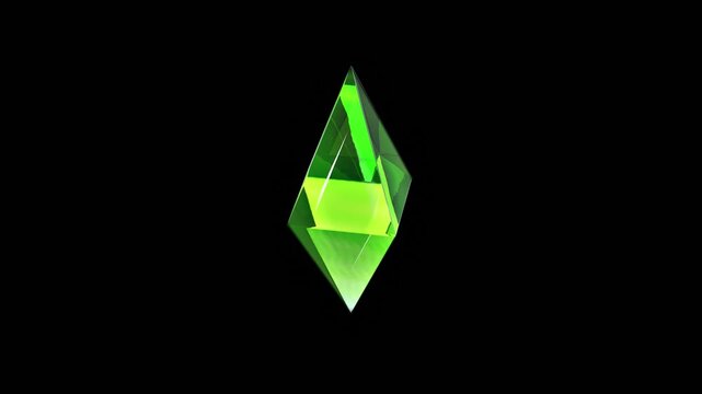 Green glass crystal seen from above turning on black background