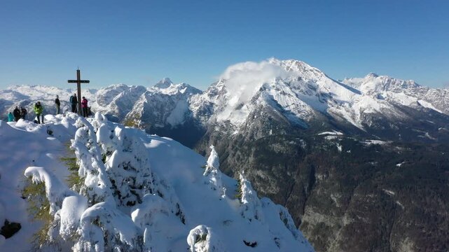 Drone video, alpine panorama in winter when the weather is nice, summit of the Jenner with summit cross, Watzmann in the back, Berchtesgaden National Park, Berchtesgaden Alps, Sch&ouml;nau am K&ouml;nigssee