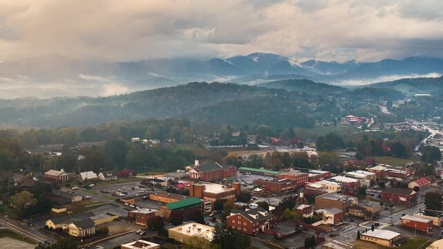Franklin, North Carolina at sundown. Popular tourist town surrounded by dark Appalachian mountain hills.