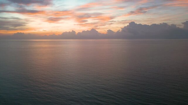 Serene pastel horizon glowing over calm miami waters