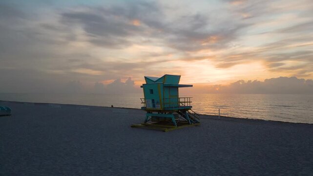 Serene dawn light over a miami beach lifeguard tower