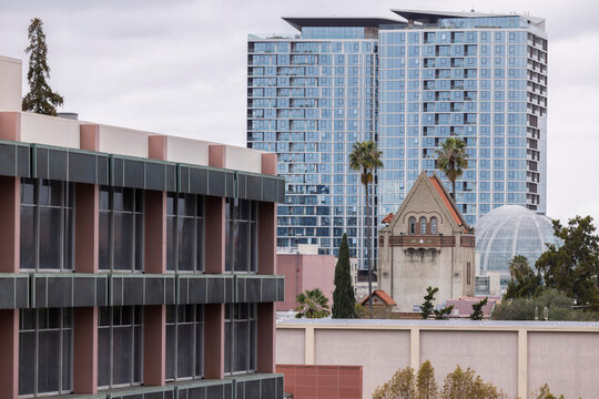 Daytime view of a church and skyline of downtown San Jose, California, USA.