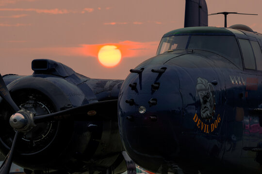 B 25 Mitchell nose art and radial engine at sunset