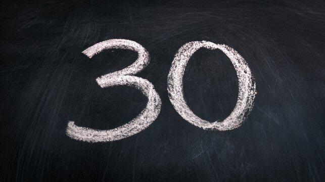 Chalk-written number 30 appears on a dark chalkboard surface as part of a 90 day challenge concept by a blogger.