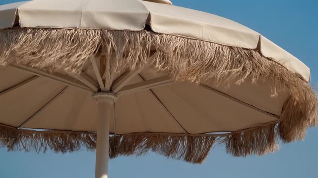 Beach umbrella fringe fluttering