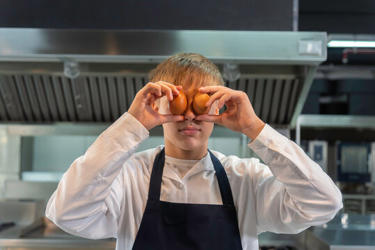 Young Chefs Student studying cooking food in class at school kitchen.