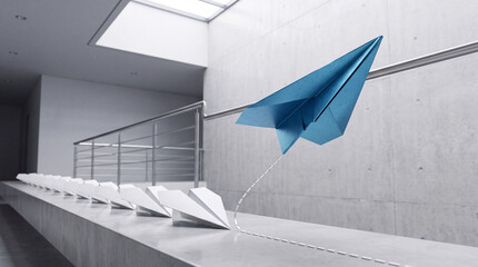 Fototapeta premium A Blue Paper Plane Soaring High Above a Row of Stationary White Planes in a Modern Minimalist Concrete Office Hallway, Representing Leadership, Innovation, Success, and Thinking Outside the Box.