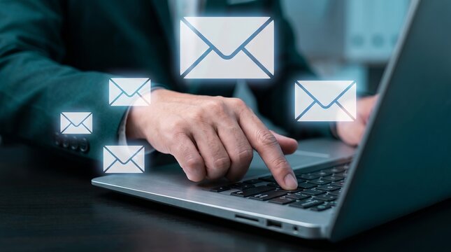 Person Typing on Laptop with Email Icon Hologram Concept of Digital Communication